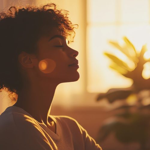 Mindful Breathing for Stress Relief - A person practicing mindful breathing exercises in a quiet room with soft lighting, focusing on relaxation and releasing tension